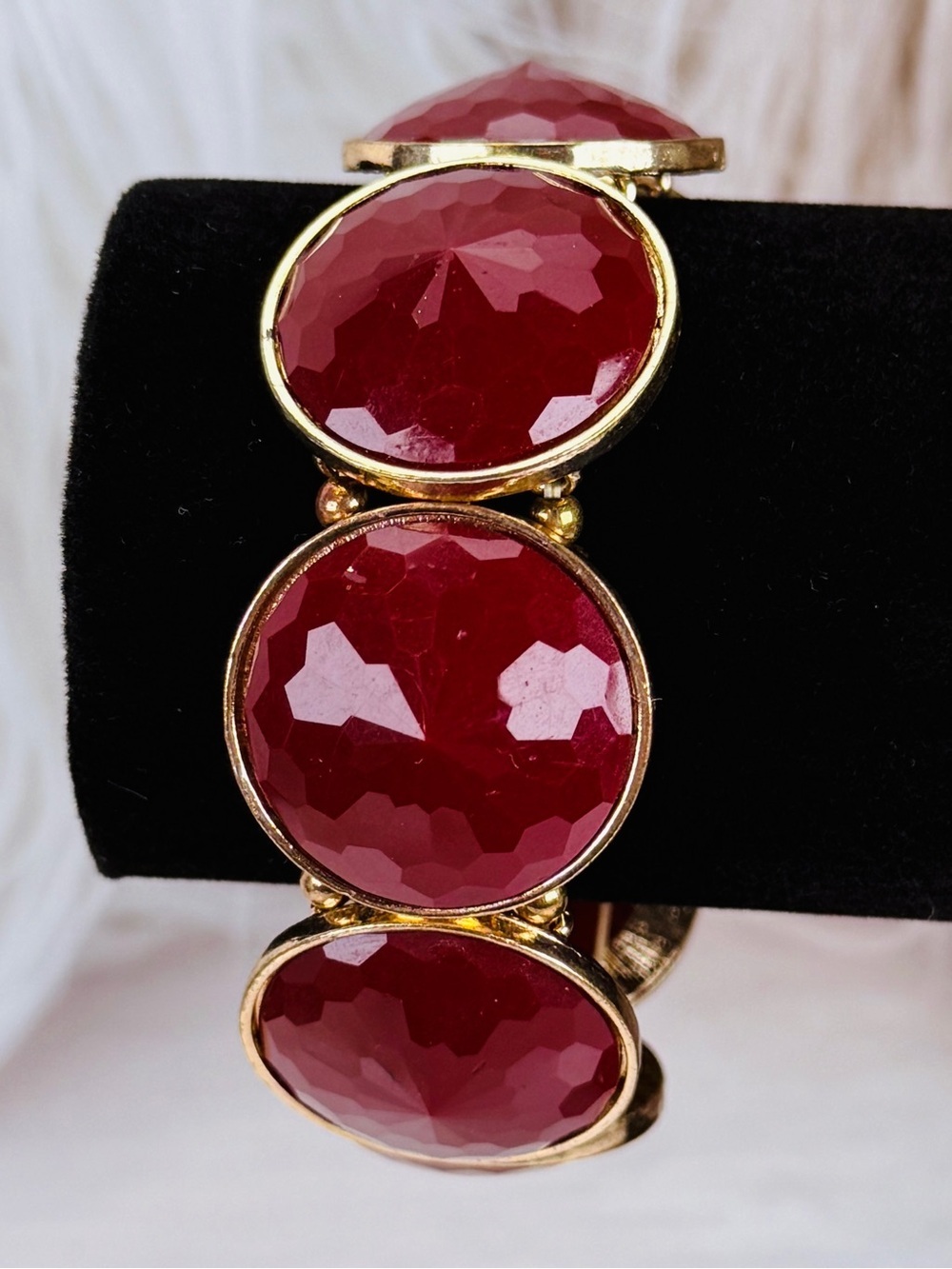 Goldtone, rust color costume stretch bracelet